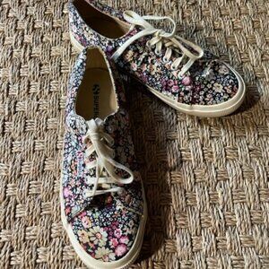 Superga 2750 lace up low sneaker in black ditsy floral print satin